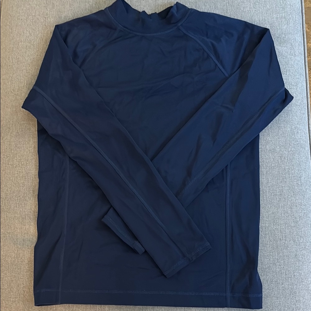 Boys navy Lands’ End swim shirt medium. NO signs of wear, PERFECT condition.